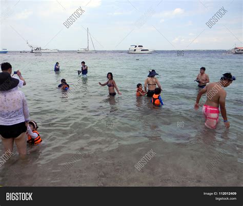 swim in tagalog